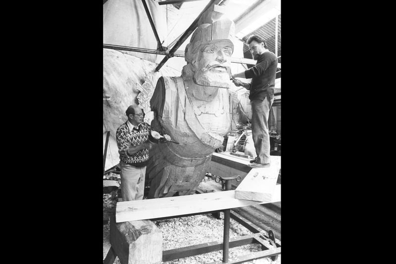 Jack Whitehead (left) and Norman Gaches sculpt Warrior's figurehead in October 1987. The News PP5408