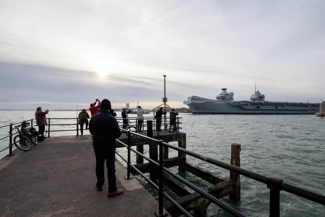Fond farewell: well-wisher wave off HMS Queen Elizabeth in Portsmouth this week
Picture: Habibur Rahman