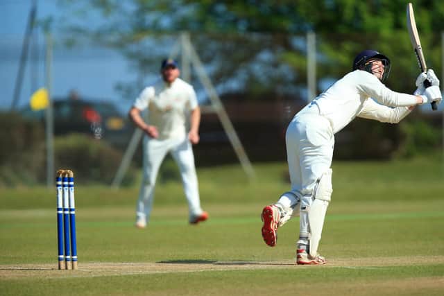 Ben Duggan hits out on his way to 96 against Liphook.