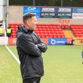 Assistant head coach, Jon Harley, left, and head coach John Mousinho, right.