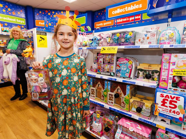 Rosie was happy with her new toy at the Toys R Us grand opening in Havant.