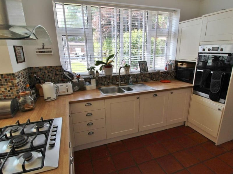 This property comes with four bedrooms, two bathrooms and three reception rooms.