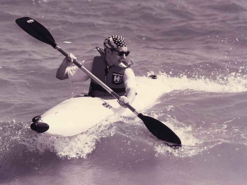 Havant canoeist Michael Grimes, 17, splashes around in the warm sea water in 1993. The News PP3025