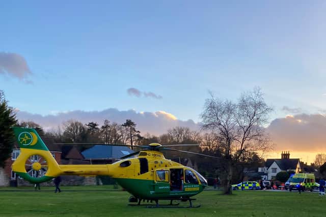 The air ambulance was called to a collision involving a grey BMW and a cyclist in Rowlands Castle. Picture: Paul Garrod