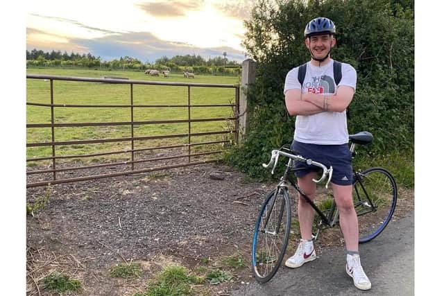 Harrison Read, 23, has filmed a documentary about cycling and mental health. Pictured: Harrison with his bike