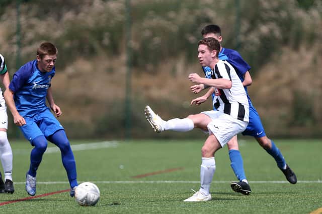 Hayling United (stripes) voted for points-per-game over the last two seasons to decide the Hampshire Premier League. Picture: Chris Moorhouse