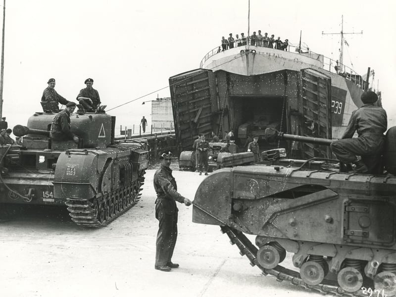Loading Churchill tanks on L.S.T.s
(c) The News, War Series 2976