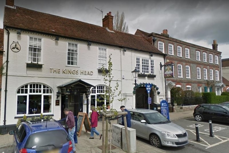 The King's Head in The Square, Wickham, has a real fire according to the Fullers website.