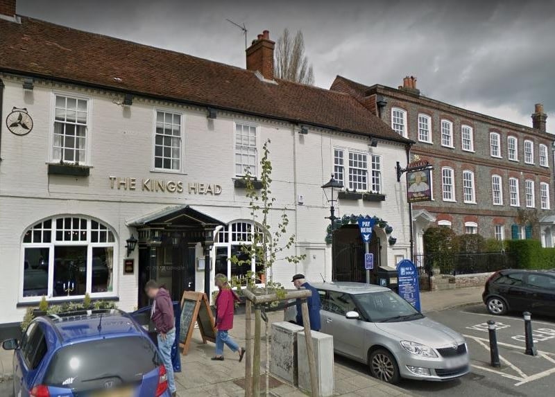 The King's Head in The Square, Wickham, has a real fire according to the Fullers website.
