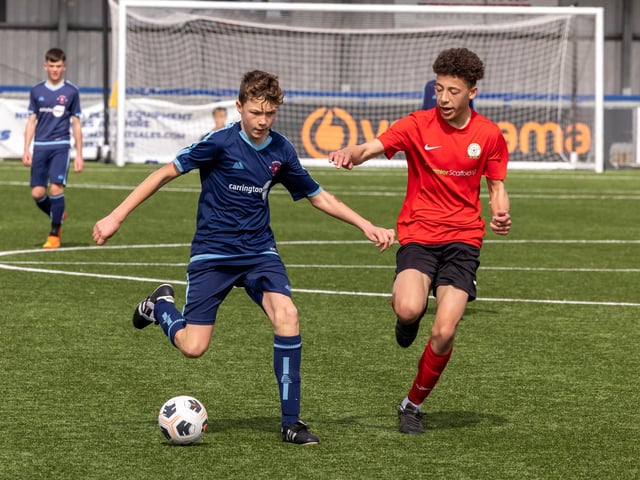 Action from the Under-14 Memorial Challenge Cup final between Pickwick Youth Pumas (all blue kit) and Horndean Youth Red. Picture: Mike Cooter