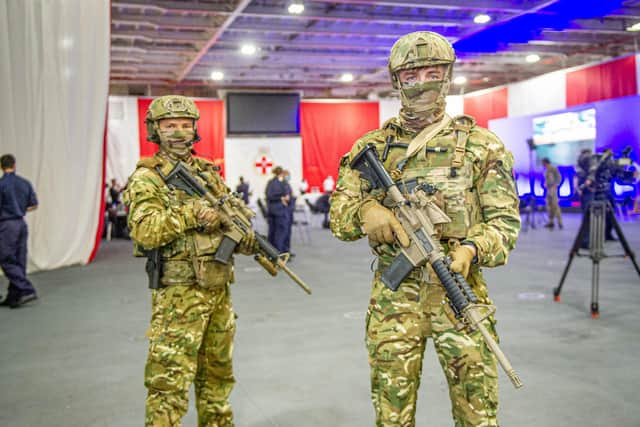 Two Royal Marines from the future commando force, small team strike group, wearing their new uniforms on HMS Prince of Wales

Picture: Habibur Rahman