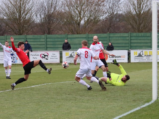 Josh Benfield about to score Fareham's second goal. Picture by Ken Walker