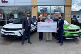 From left to right: James Kurd, Mr Sadler, Mrs Sadler, and Ian Simpson, branch manager, at Eden Vauxhall Fareham