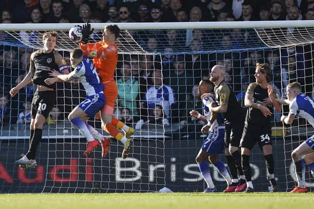 Matt Macey challenges for the ball during Pompey's 2-0 win at Bristol Rovers on Saturday. Picture: Jason Brown/ProSportsImages