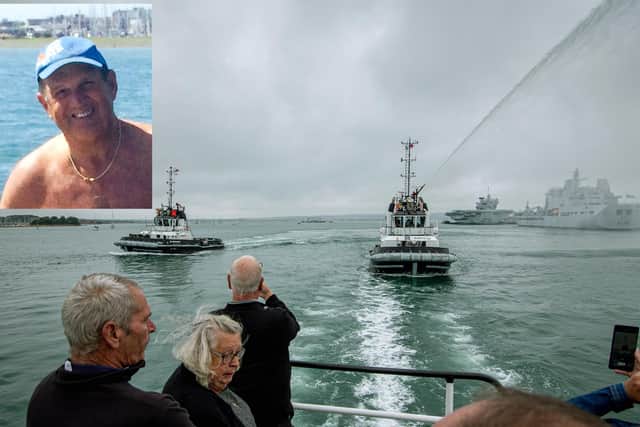 A tug boat puts on a water jet display in memory of Alan Weeks, pictured, as his family watches
Picture: Habibur Rahman