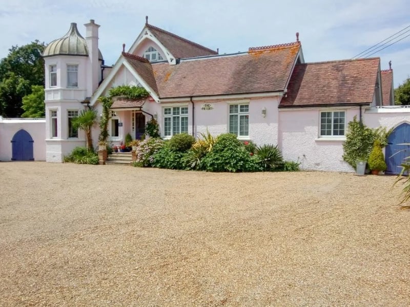 The Zoopla listing says: The Priory: Built in 1905 this early Edwardian property was originally used as the summer residence, for a wealthy merchant. In 1933 it became The Priory School, Hayling Island, and was used as an annexed boarding junior school for Lynton House School, Portsmouth.'
The property offers five bedrooms, five reception rooms and three bathrooms.