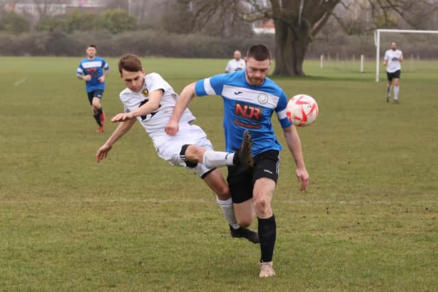Bransbury (blue) v Pompey Chimes. Picture  by Kevin Shipp