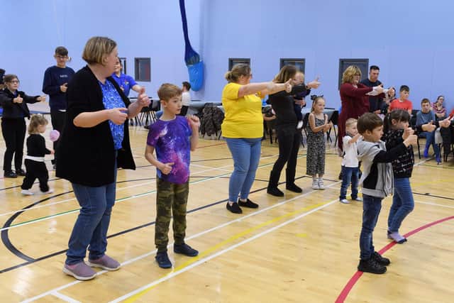 Pictured is: Enjoying a bit of a dance session
Picture: Keith Woodland (131121-12)