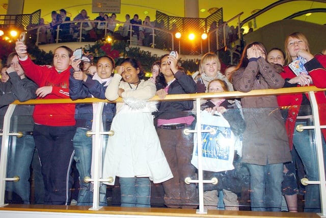 Flashback to 2005: The crowd to watch Kemal from the TV reality show Big Brother in the food court of The Cascades shopping centre switch on the Christmas lights. Unfortunately, the lights came on prematurely after a practise countdown initiated by Kemal went wrong.
