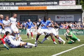 Bournemouth's Christian Saydee puts himself about in the first half of Pompey's pre-season victory at the Hawks. Picture: Jason Brown/ProSportsImages