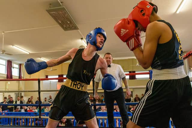 Waterloovile Boxing Club's Troy Cook (left) takes on Jamal Franklin. Picture: Vernon Nash