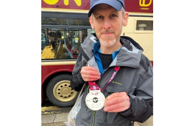 Simon Rowe has completed the London Marathon for charity after his niece was diagnosed with a rare liver condition. 
Pictured: Simon after he finished the marathon.