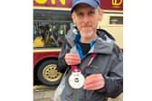 Simon Rowe has completed the London Marathon for charity after his niece was diagnosed with a rare liver condition. 
Pictured: Simon after he finished the marathon.