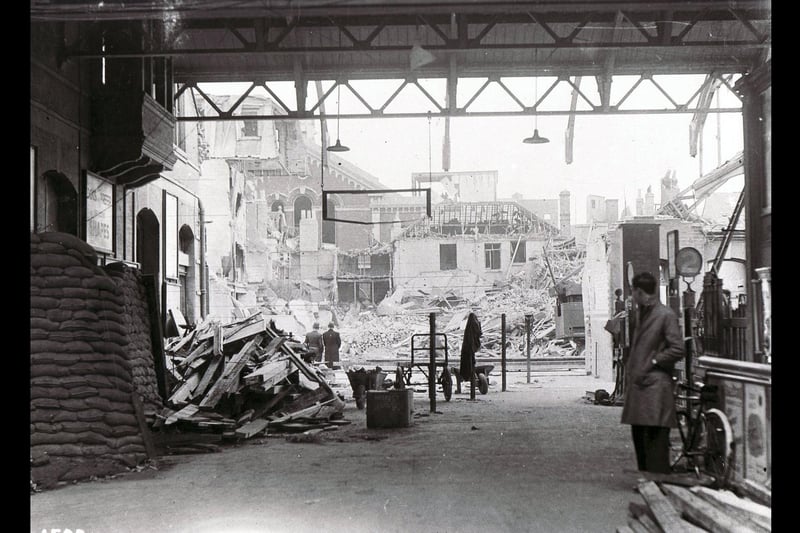Although bombs caused destruction all around it, Portsmouth & Southsea railway station suffered comparatively little damage, apart from broken glass. This picture was taken in the station looking out to Station Street