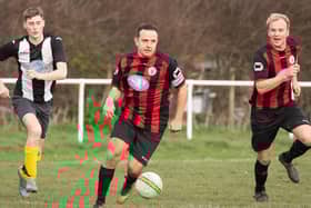 Jake Alford (red/black, middle of picture) netted twice as Fleetlands thumped Overton 5-1. Picture: Keith Woodland