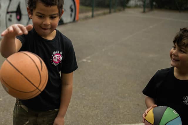 Sonny and Reuben, Craig Hughes' sons, practising their games