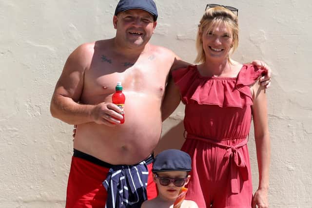 Hot weather in Southsea.

Pictured is Day Gary Byrne, 44, Son Paddy, 3, and Mum Casey Otterway, 34.

Picture: Sam Stephenson