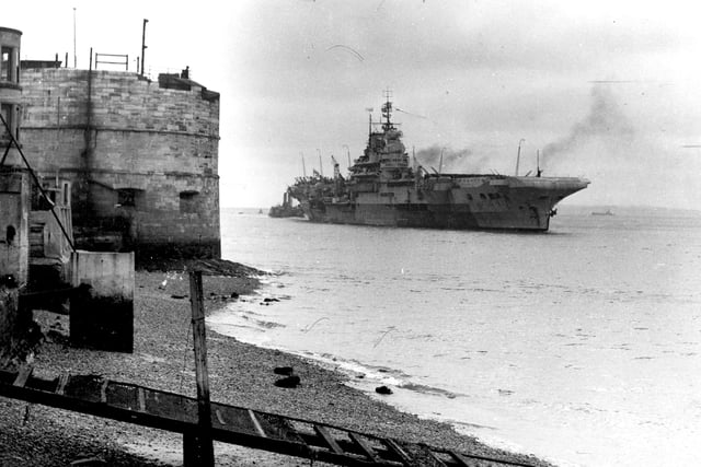 HMS Indomitable goes past the Round Tower in 1953. The News PP690