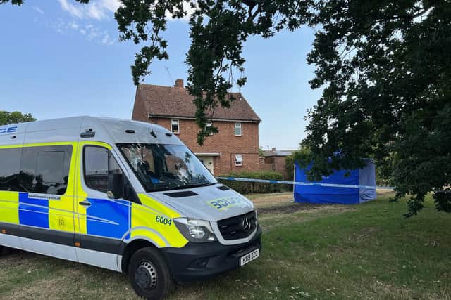 A police tent is still in place behind a taped-off area outside the property in Leigh Park Picture: Richard Lemmer