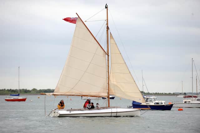 terror   5/5/9   (JT)The Terror leaves emsworth harbour , a restored oyster trawler. Pictured on board is Judi Darley of the Chichester Harbour Conservancy , Stamford Stoddard - Skipper (cream hat/yellow jacket), Ian Mcintyre crew member (blue cap)PICTURE: PAUL JACOBS (091613-17)