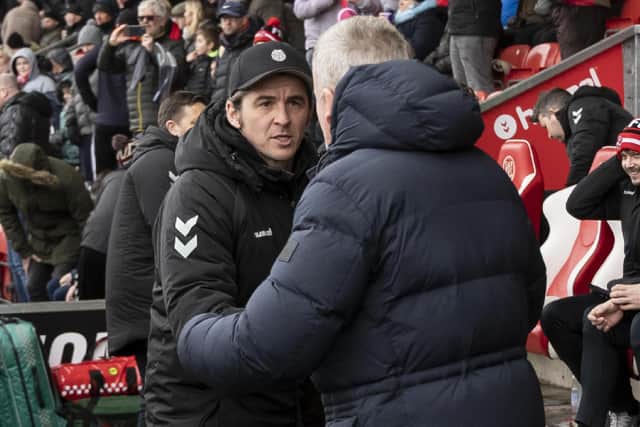 Fleetwood boss Joey Barton and Pompey manager Kenny Jackett. Picture: Daniel Chesterton/phcimages.com