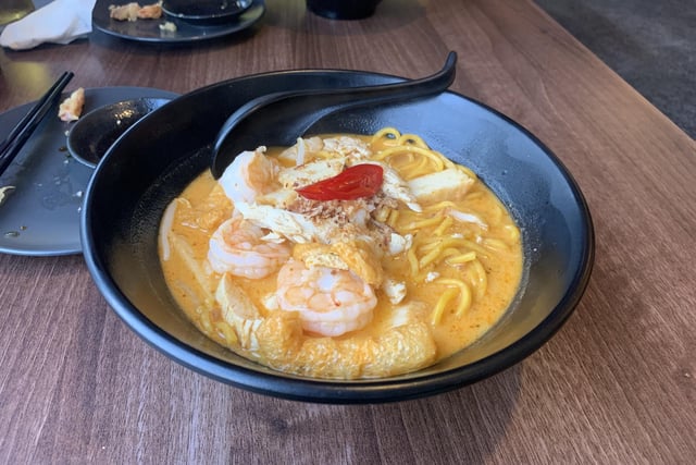 The laksa noodle soup, a Malaysian dish which combines the flavours of curry and ramen, was one of the most memorable dishes The Dish Detective ate this year: a 'vibrant bowl of heaven that became more addictive after each spoonful'.