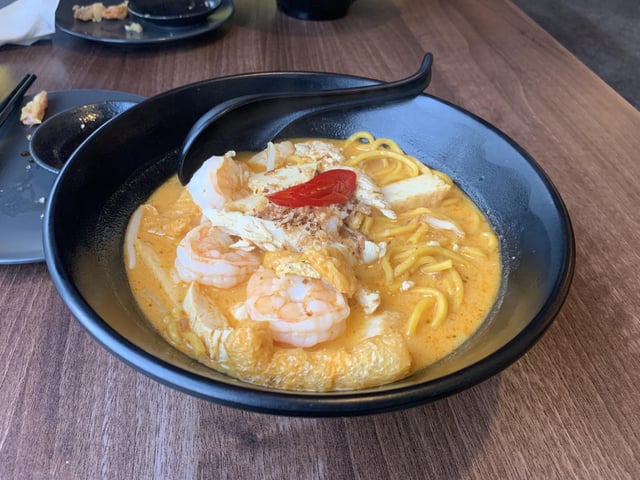 The laksa noodle soup, a Malaysian dish which combines the flavours of curry and ramen, was one of the most memorable dishes The Dish Detective ate this year: a 'vibrant bowl of heaven that became more addictive after each spoonful'.