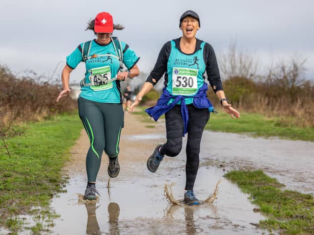 Runners on Milton Common during the Portsmouth Coastal Half Marathon. Picture: Mike Cooter (180224)