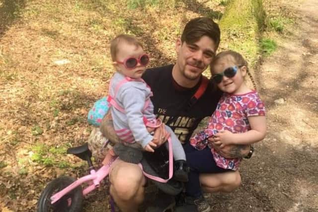 The fiance of Alex Britton - Aaron Law and the couple's daughters Ava, 18 months, and Payton, three. Mum-of-two Alex, 28, died in a horrific crash on August 25 near Andover while on her way to work. 