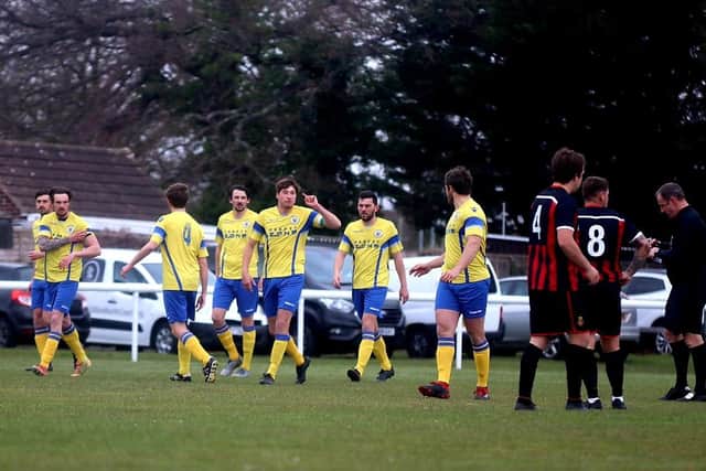 Locks celebrate Jordan Whiteley's early winner at Fleetlands. Picture: Tom Phillips.