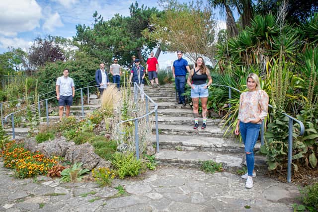 Pictured are artists, from left: Joe Munro, Kevin Dean, Mark Persaud, William Sutton, Clarke Reynolds, Ryan Dodd, Michael McKenzie, Angela Chick and project manager, Billie Coe, at the Rock Garden, Southsea. Picture: Habibur Rahman