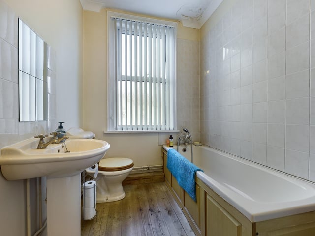 Thie two-bedroom apartment is on the market for £185,000. It is listed by Chinneck Shaw.