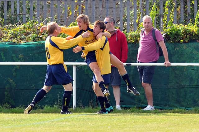Moneyfields celebrate their FA Cup equaliser against Gosport in 2011. Picture: Steve Reid