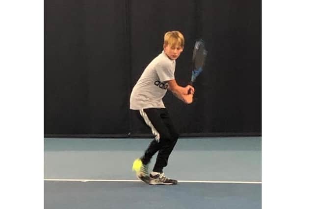 The family of Lewis Taylor, 15, have set up a fundraiser so he can stay out at his tennis school in Florida after his parents had to close their pub due to Covid-19. Pictured: Lewis training on New Year's Eve 2019