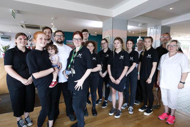 Owner Sara Pollard-Dambach, fifth from left, and her staff at the opening of McDambi's restaurant in West St, Fareham
Picture: Chris Moorhouse (jpns 240821-21)