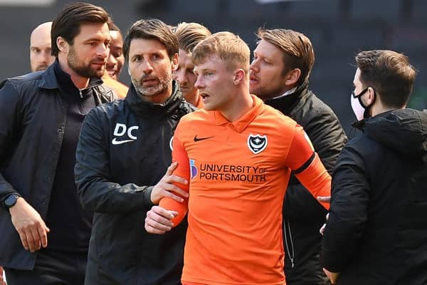 Portsmouth FC manager Danny Cowley  leads an angry Portsmouth FC midfielder Andy Cannon (14) away during the EFL Sky Bet League 1 match between Milton Keynes Dons and Portsmouth at stadium:mk, Milton Keynes, England on 17 April 2021. Picture: Dennis Goodwin