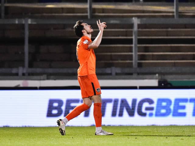 John Marquis celebrates giving Pompey the lead in the first half against Bristol Rovers in tonight's Memorial Stadium encounter. Picture: Graham Hunt/ProSportsImages