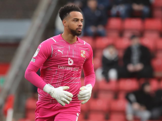 Club: Swindon; Age: 25; Appearances this season: 33; Clean sheets: 9; Goals conceded: 41. Verdict: Wollacott has had an instant impact with Swindon after joining from Bristol City last summer. He has become more comfortable in possession and improved his distribution which has led him to be rewarded with the number one shirt with Ghana as well as being one of the standout keepers in League Two this term.