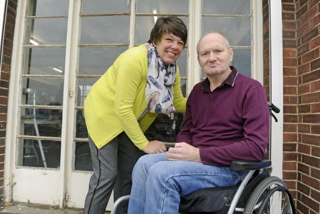 Lorraine Pratt with her husband Kevin who has been left severely disabled after contracting viral encephalitis. 
Picture Ian Hargreaves  (171235-1)