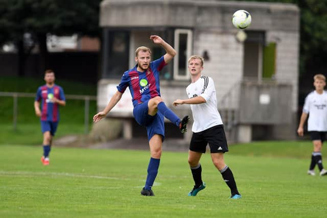 US Portsmouth' Ryan Smart (maroon/blue).
Picture: Neil Marshall